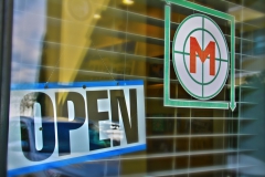 OPEN sign at Resident Manager office at  Third and Main
